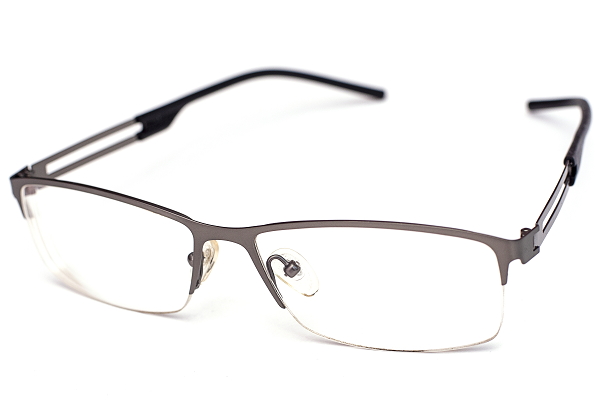 Beautiful metallic grey sunglasses with a thin frame isolated on white background